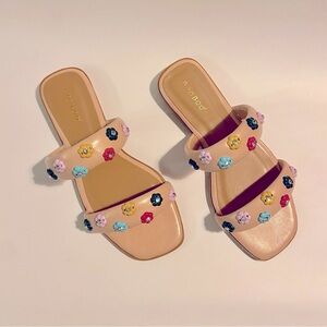 Studded floral slide sandal: Tan faux leather embellished w colorful flowers